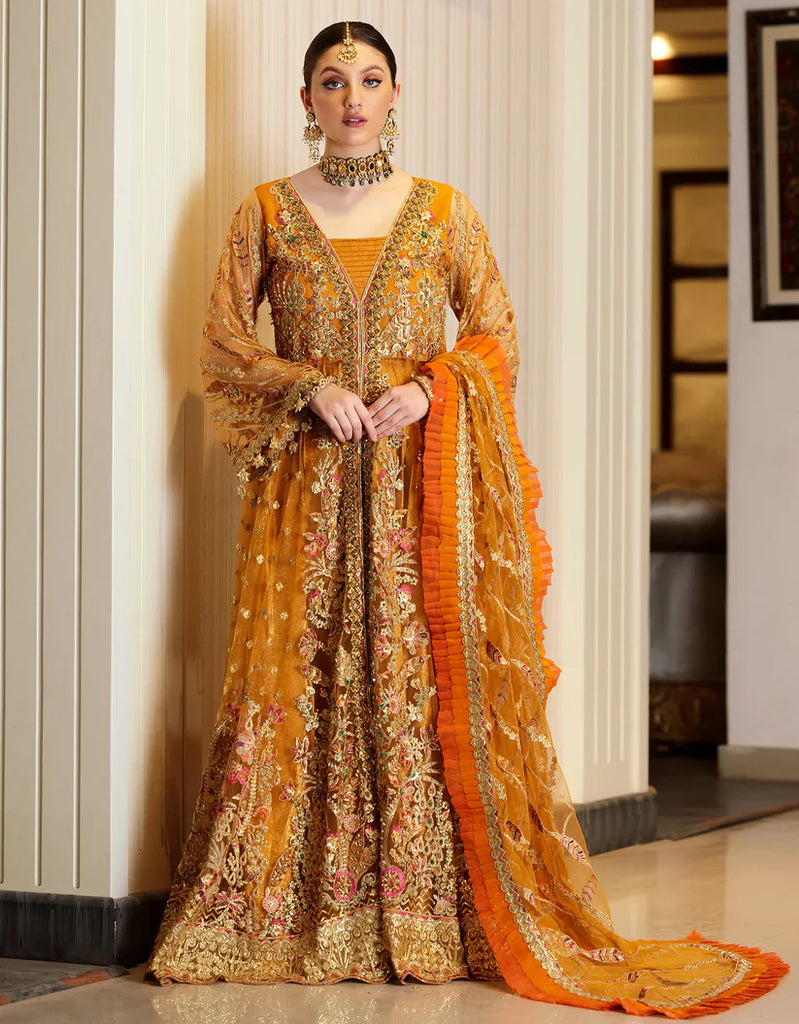 Mustard-orange Pakistani bridal maxi gown with intricate embroidery