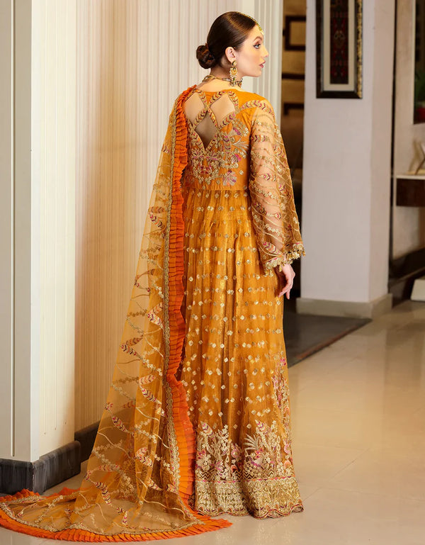 Mustard-orange Pakistani bridal maxi gown with intricate embroidery