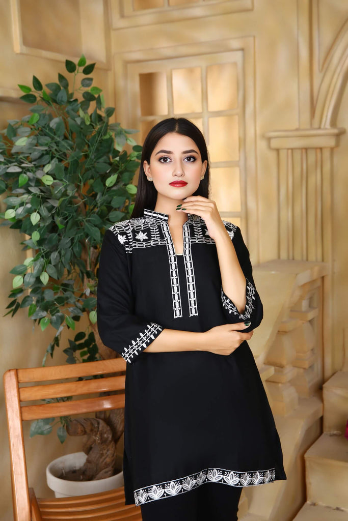 Black-linen-embroidered-kurti-for-women-with-white-threadwork-detailing