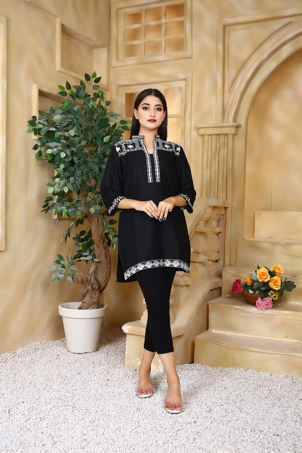 Black-linen-embroidered-kurti-for-women-with-white-threadwork-detailing